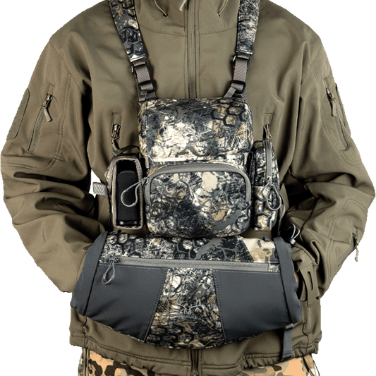 Hunting bino harness with multi-pocket design, perfect silent-adjust gear for stealthy turkey and deer hunting.