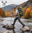 The Moxule green backpack is sturdy, durable, and has a large capacity, making it ideal for wilderness hiking, river crossings, and long-distance outdoor trips.