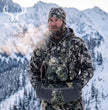  Moxule camouflage binocular chest pack with detachable hand muff in snowy mountain hunting.