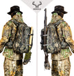 Moxule camouflage hunting backpack with external gear attachment system, shown carrying a shovel and rifle for backcountry hunting trips