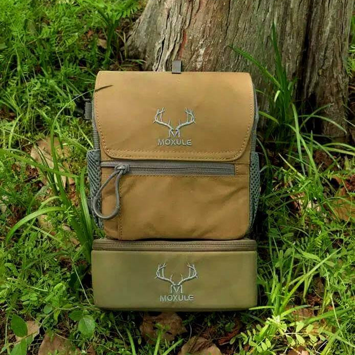 Elk hunting binocular chest pack by Moxule, coyote brown binocular harness with removable olive green storage pouch for outdoor hunts.